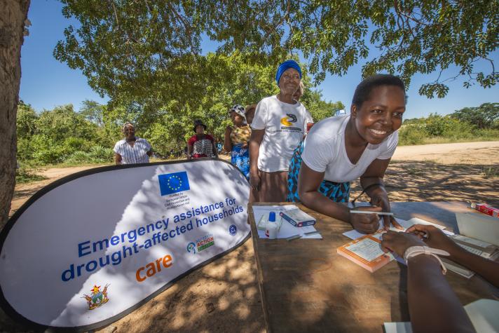 An EU-supported food distribution in the village of Zumbare. Over 7.6 million people were facing food shortages during the 2024-2025 drought, prompting the Zimbabwean government to declare a national disaster. Photo: Peter Biro/European Union. 